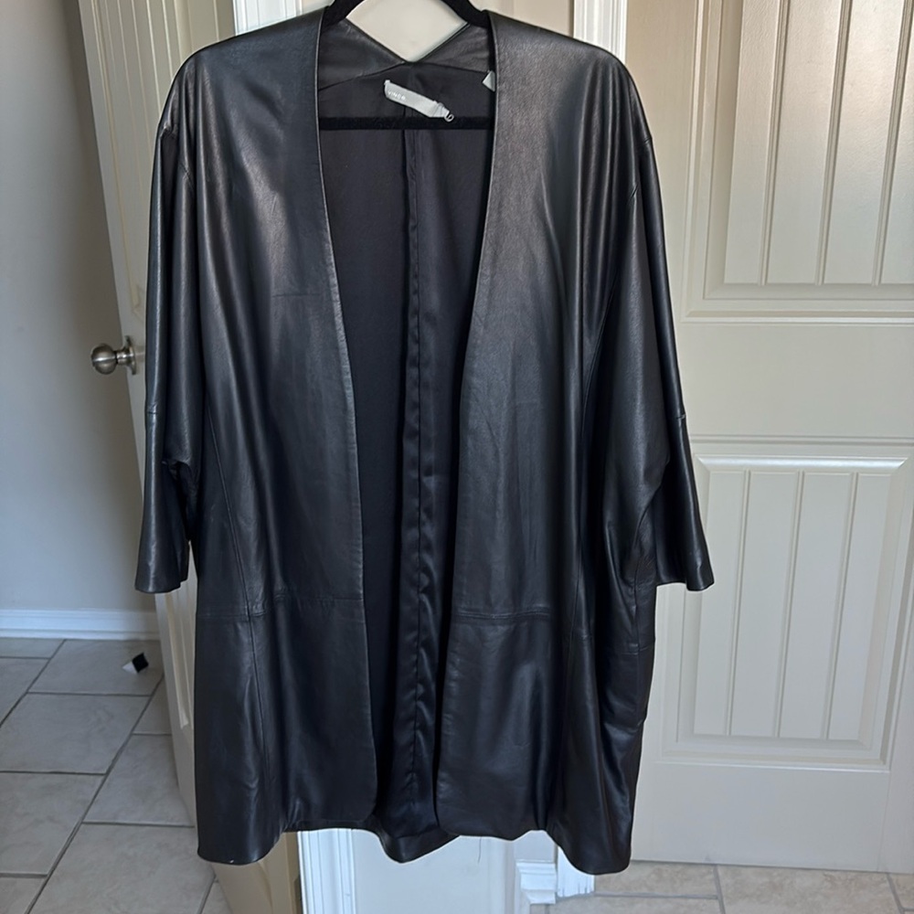 Vince lamb skin leather jacket. Dolman sleeves; no pockets. Can be worn w belt.
